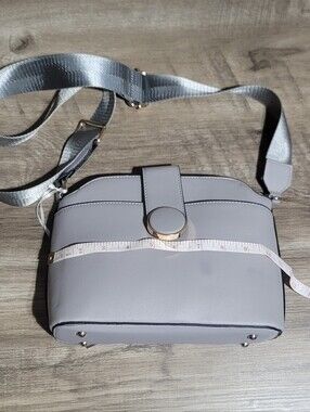 Stylish Light  Blue Crossbody Bag with Gold Accent